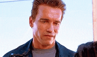 GIF of the terminator trying to smile